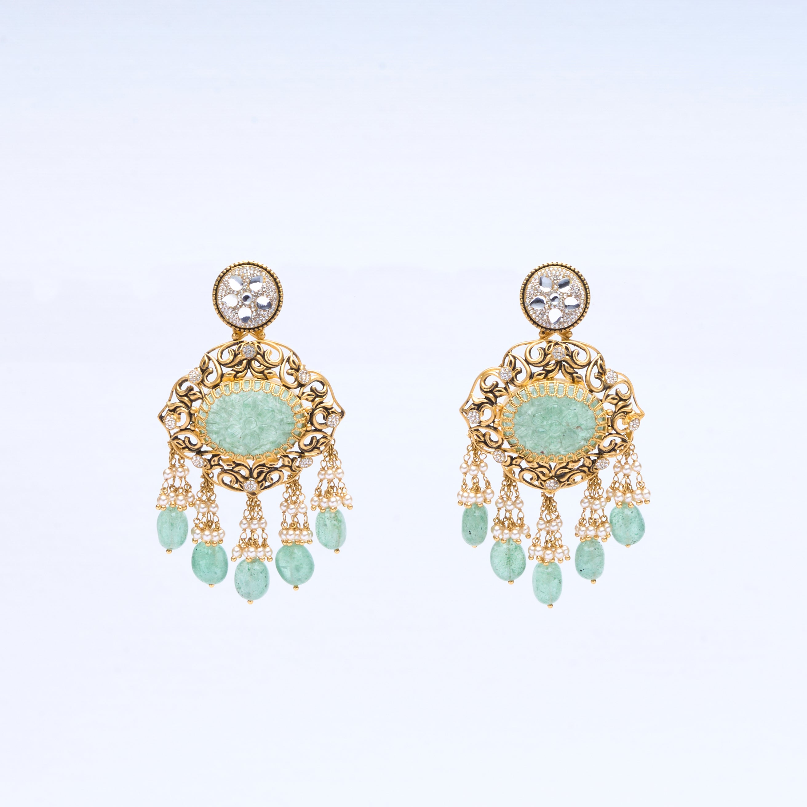  22K gold antique chandelier earrings with carved jade, pearl tassels, and polki diamond tops 