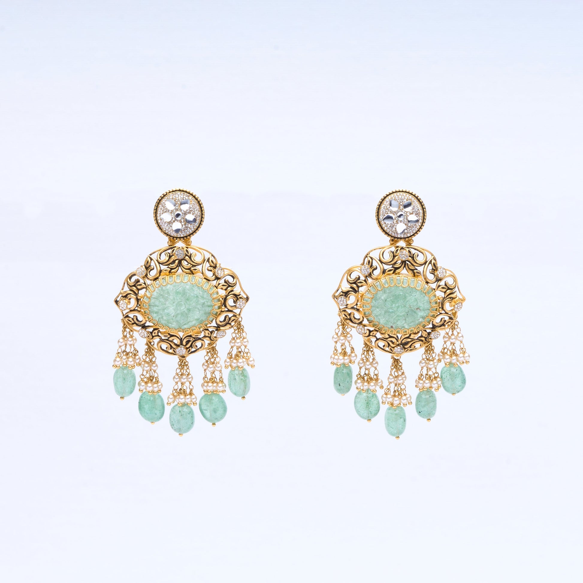  22K gold antique chandelier earrings with carved jade, pearl tassels, and polki diamond tops 