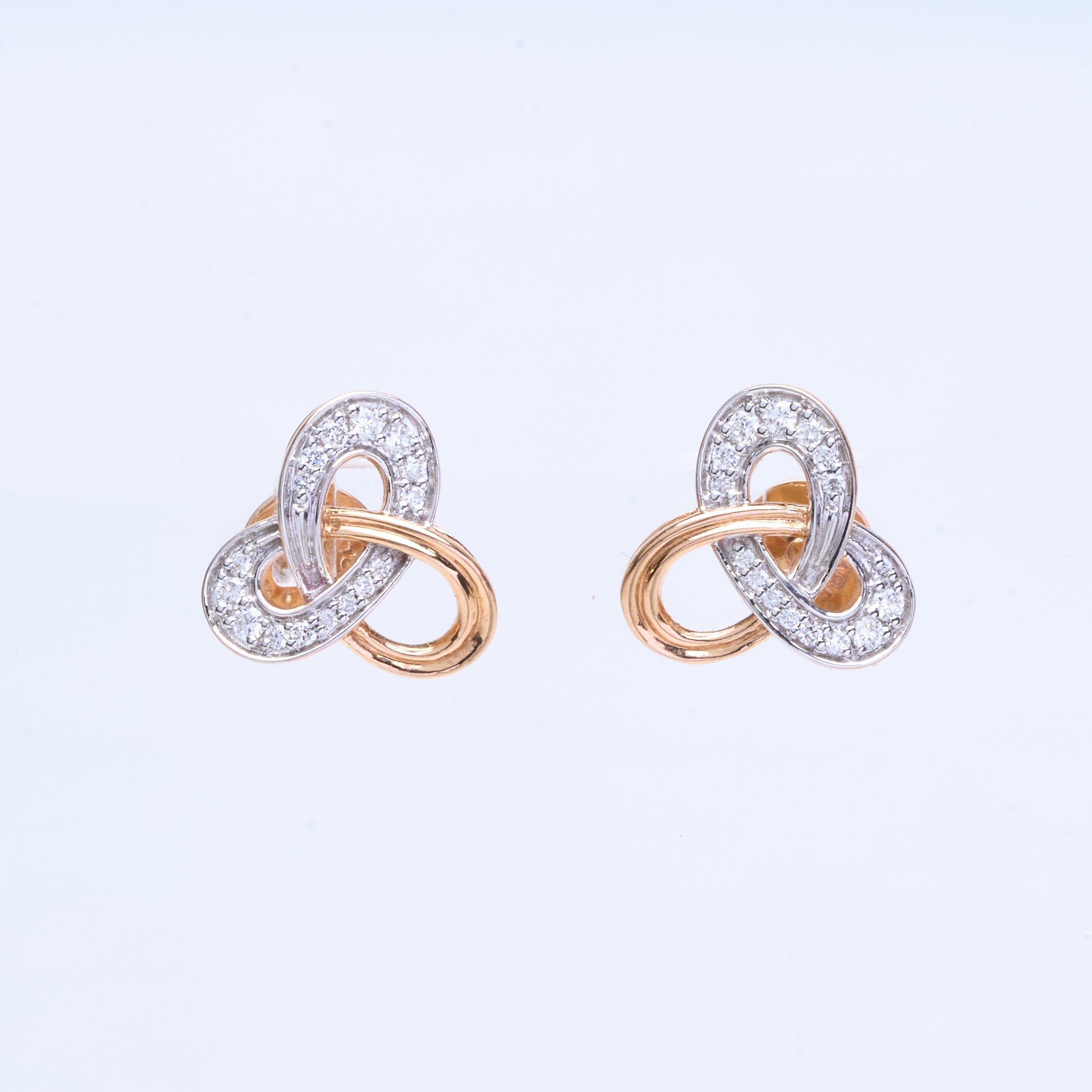 18K gold trinity knot stud earrings with diamond accents