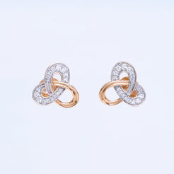 18K gold trinity knot stud earrings with diamond accents