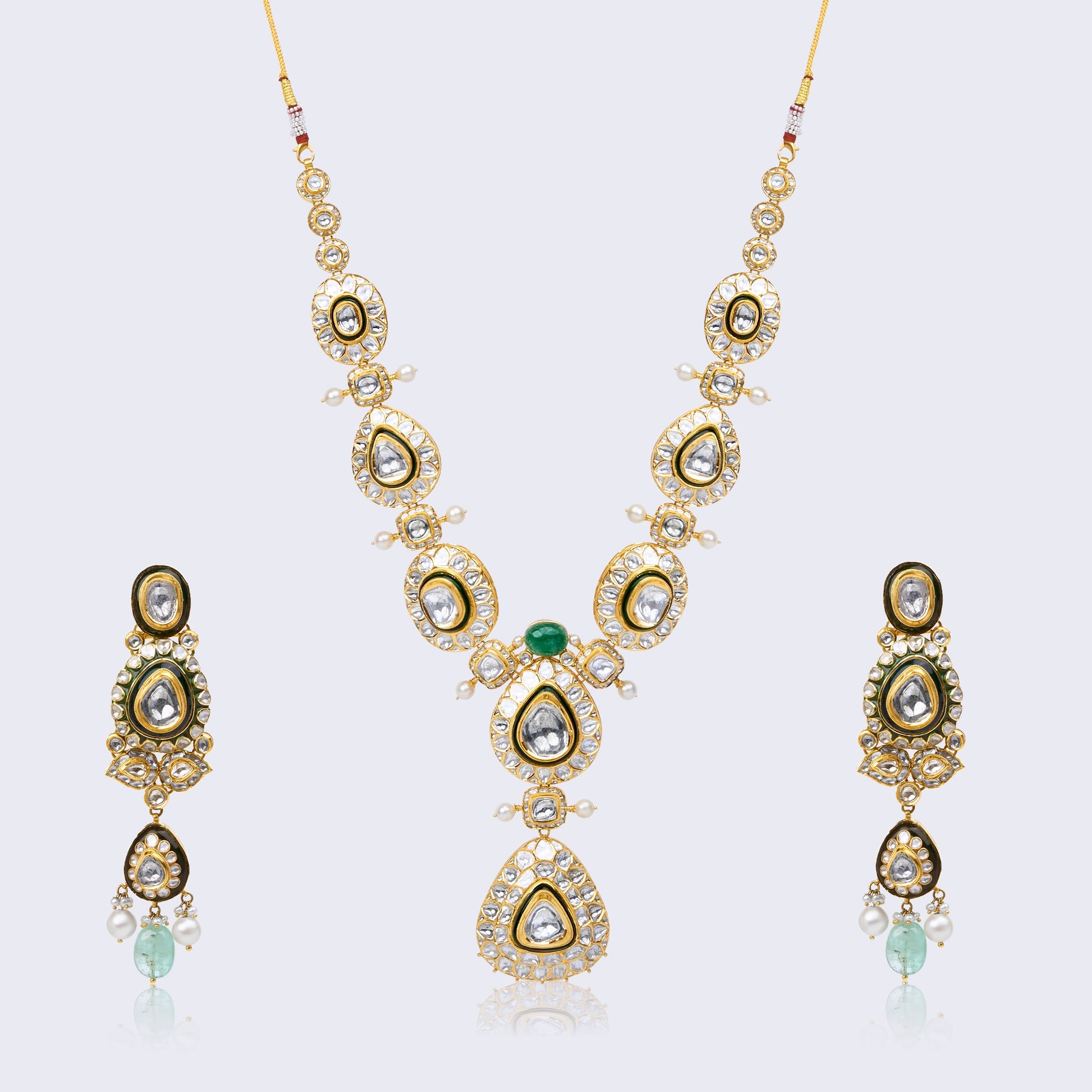 Elegant  Polki Necklace Set with Emerald Accent and Black Enamel in 22KT Gold