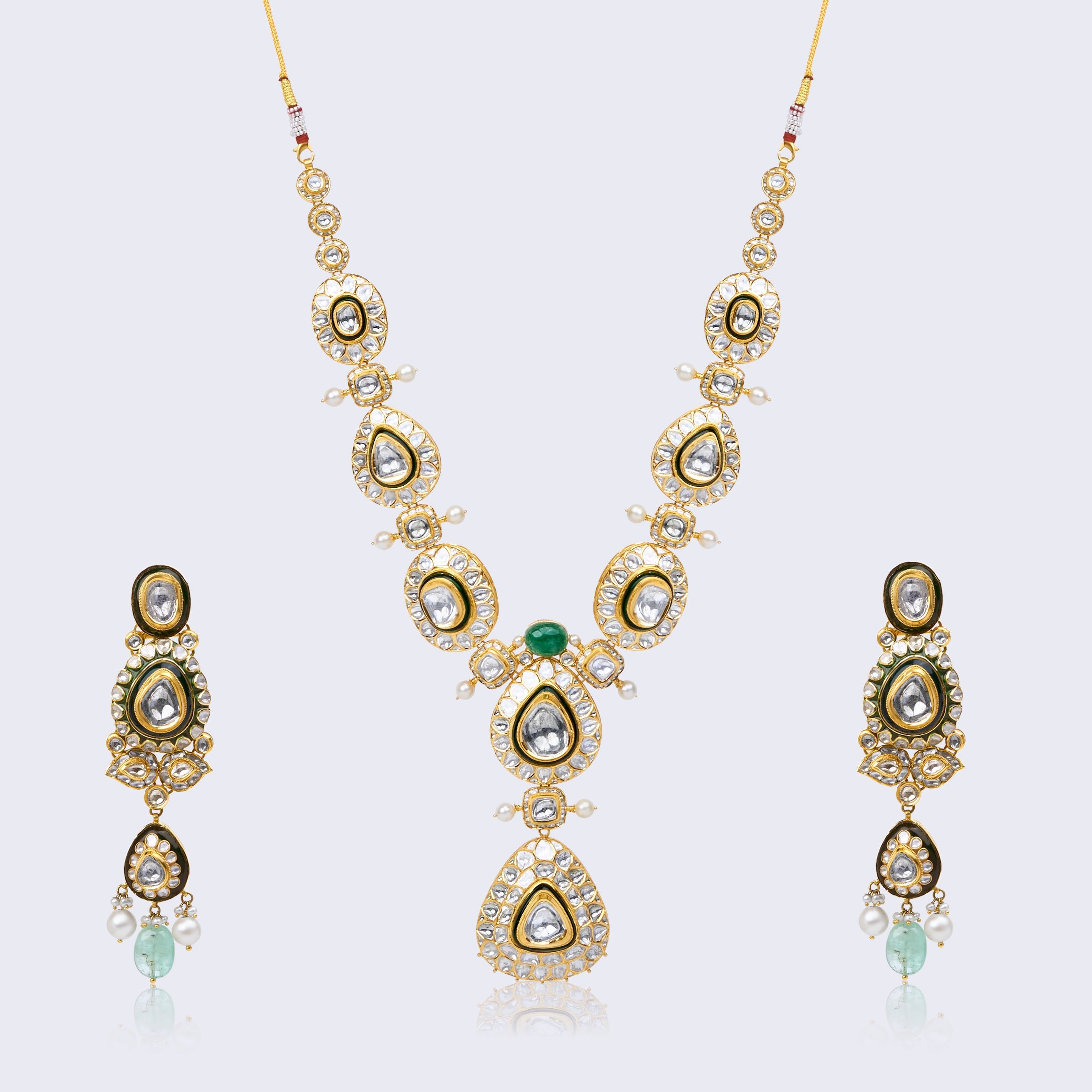 Elegant  Polki Necklace Set with Emerald Accent and Black Enamel in 22KT Gold