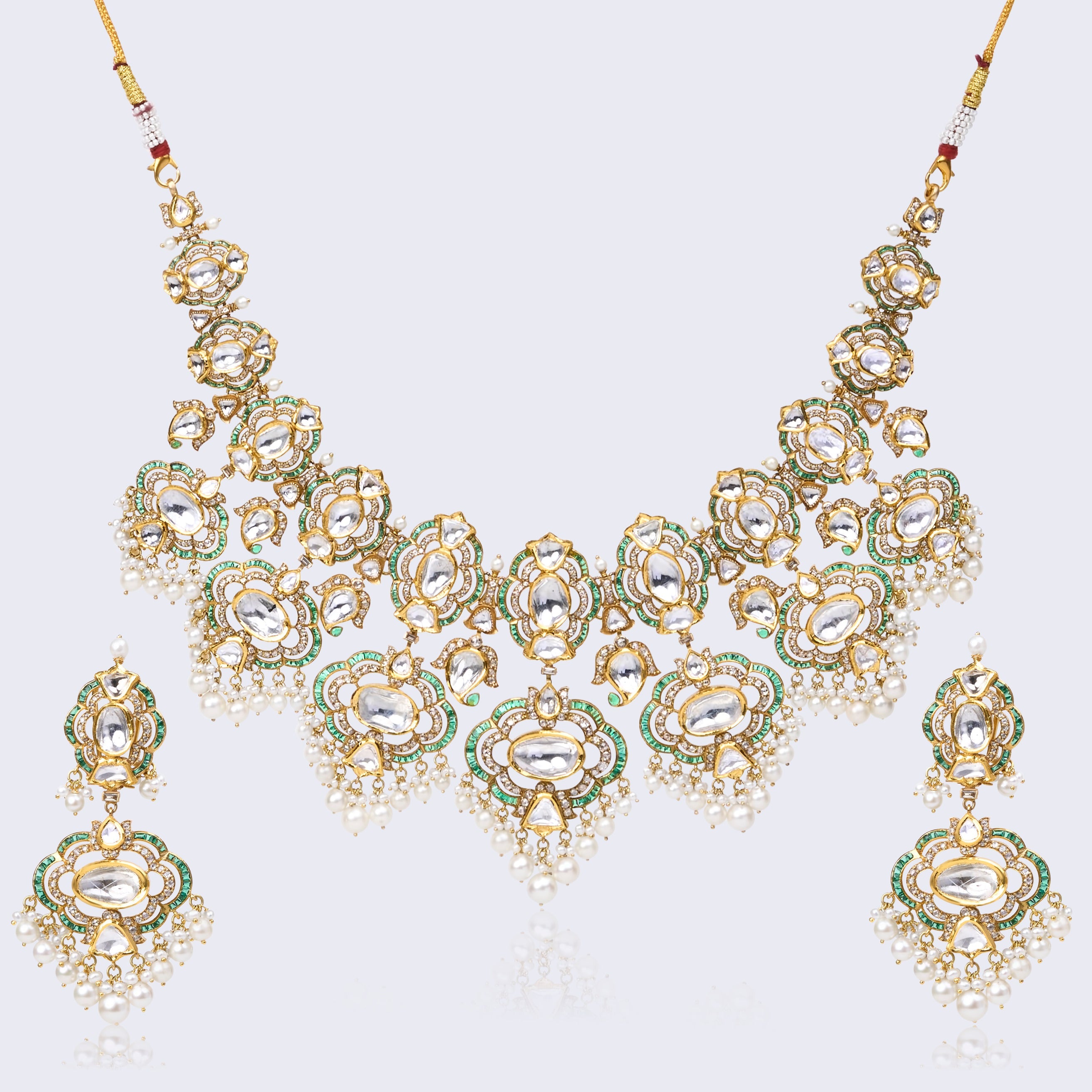 Traditional Polki Necklace Set with Pearl Drops and Emerald Accents in 22KT Gold
