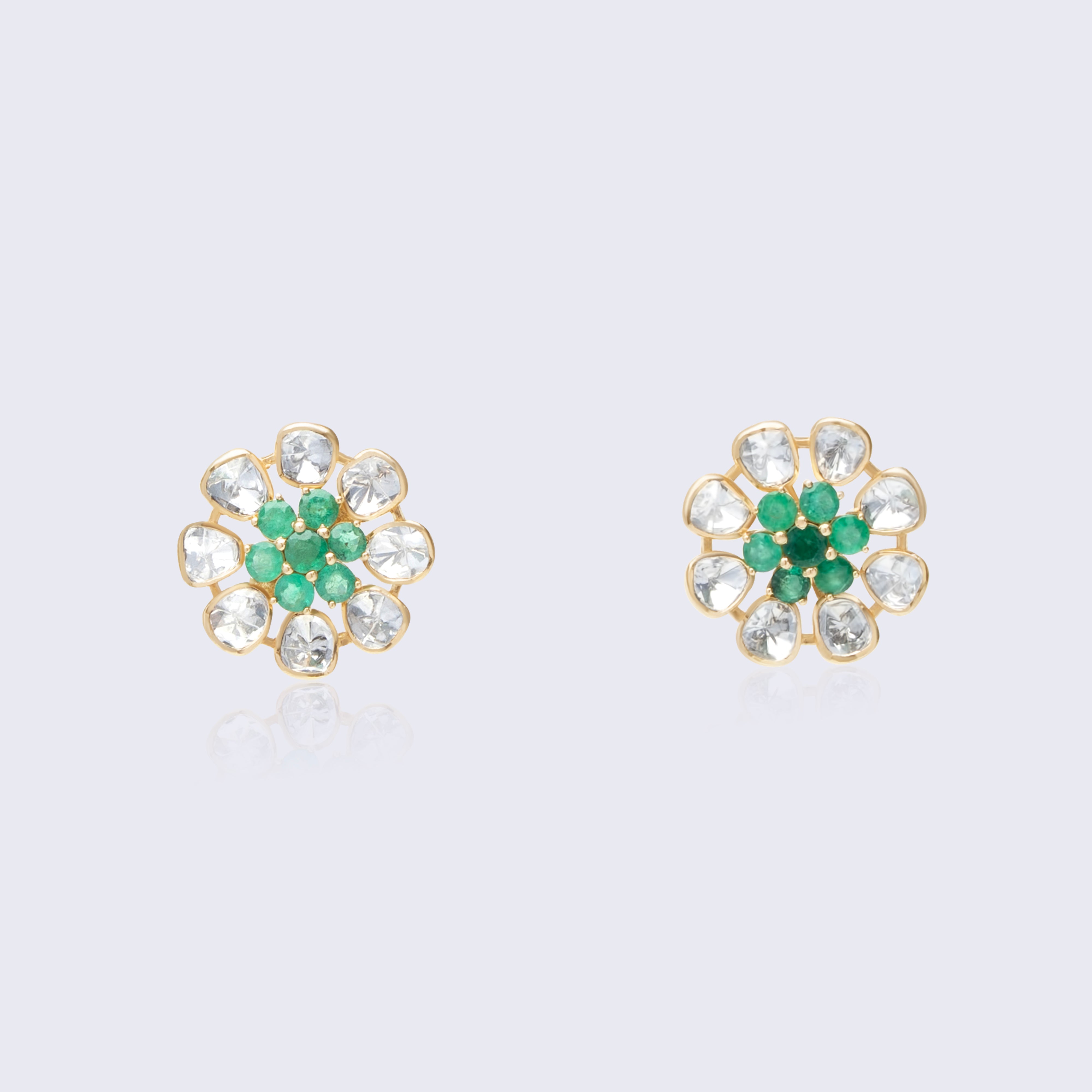 Elegant 14K gold emerald polki flower stud earrings with emerald center clusters and polki diamond petals in traditional floral design