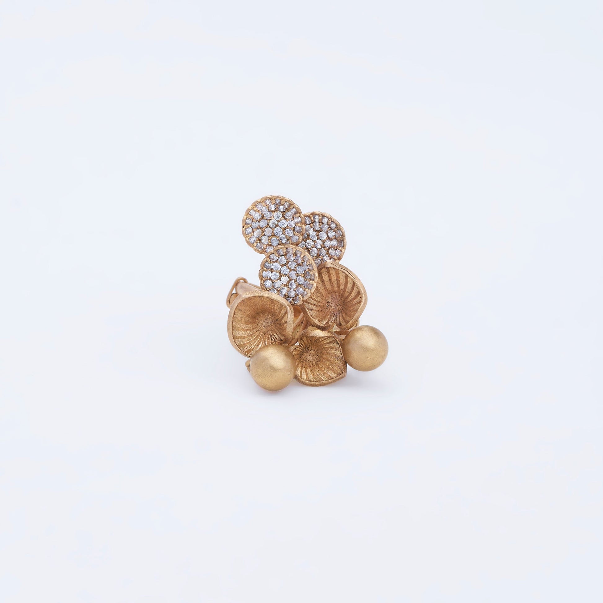 Statement ring with intricate filigree leaves, polished gold beads, and sparkling details in 22K gold.