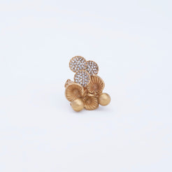 Statement ring with intricate filigree leaves, polished gold beads, and sparkling details in 22K gold.