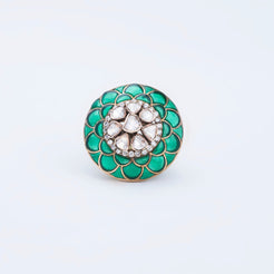 Ring with green enamel petal pattern and cluster of sparkling stones, crafted in 14K gold.