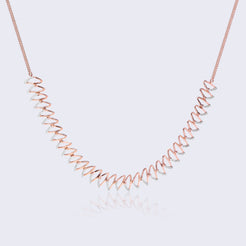 14K rose gold statement necklace with zigzag diamond design