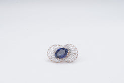 Oval blue sapphire ring with fan-style 