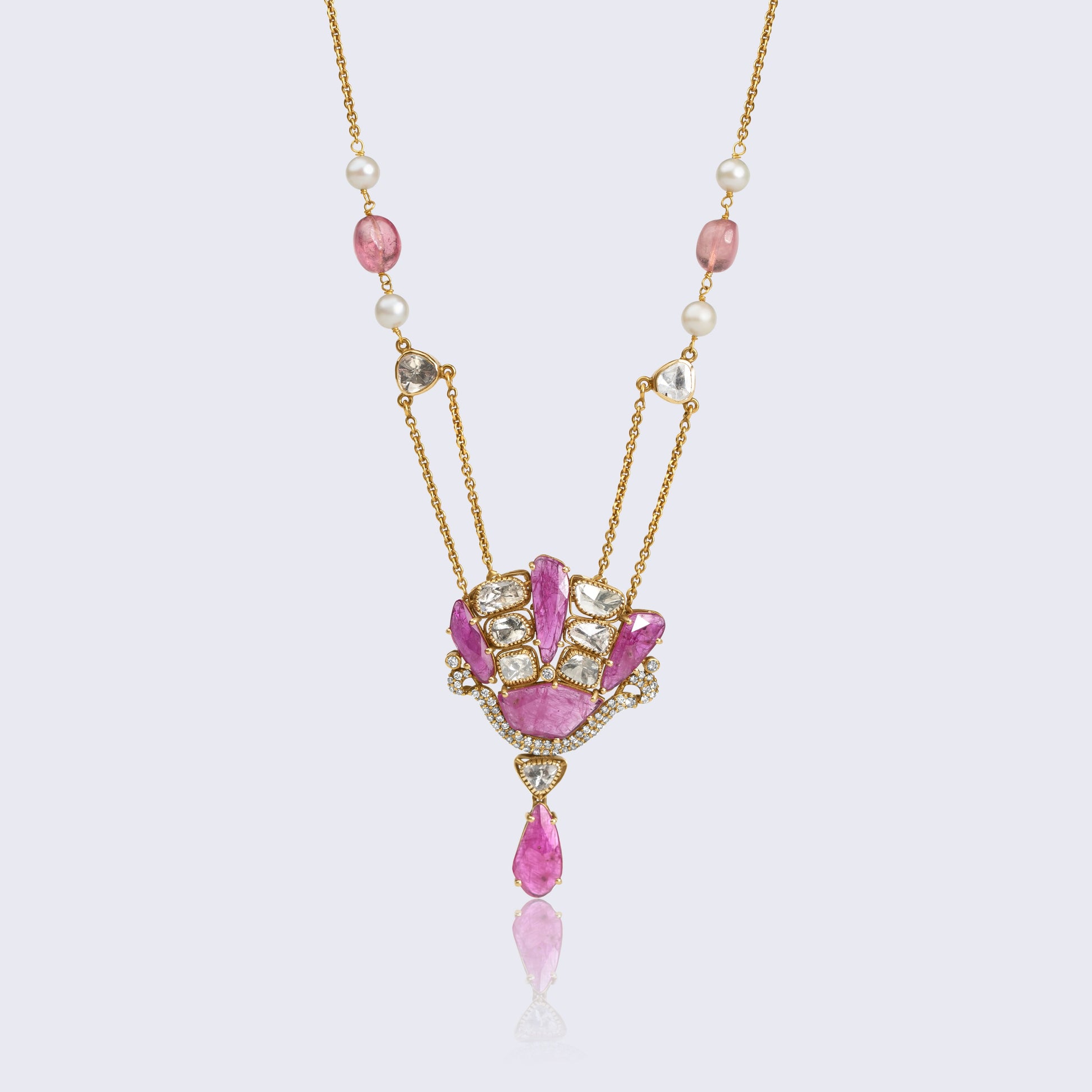 Traditional 14K gold ruby polki lotus pendant with pearl chain featuring ruby petals, polki diamonds, and natural pearl accents