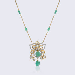 Elegant 14K gold emerald polki flower pendant with central emerald cabochon, polki diamonds, and emerald bead chain accents