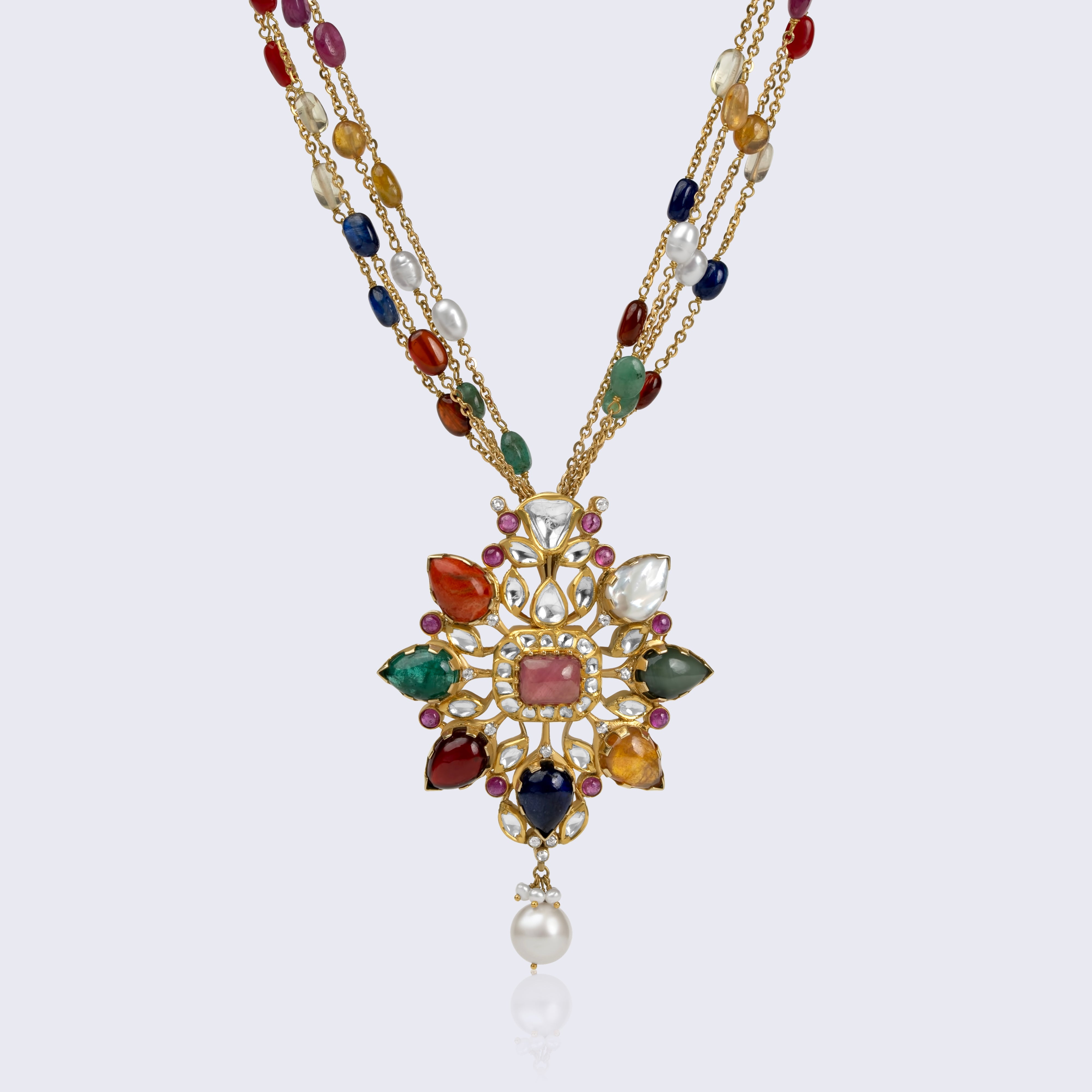 Royal 14K gold multicolor polki necklace with emerald, ruby, sapphire, citrine starburst pendant and pearl drop featuring multi-strand design