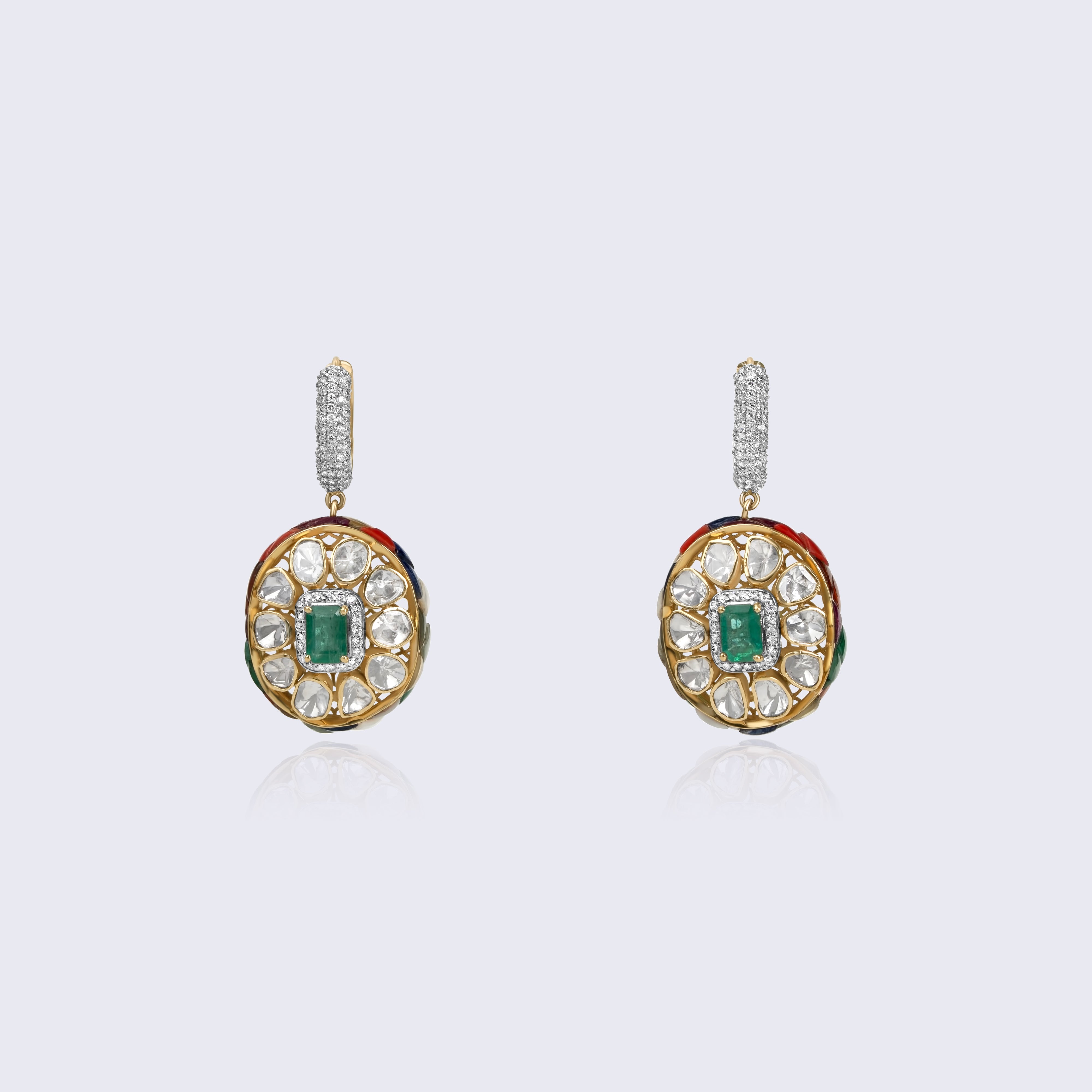 Elegant 14K gold emerald polki diamond drop earrings with central emerald stones and diamond-studded tops featuring traditional Indian craftsmanship