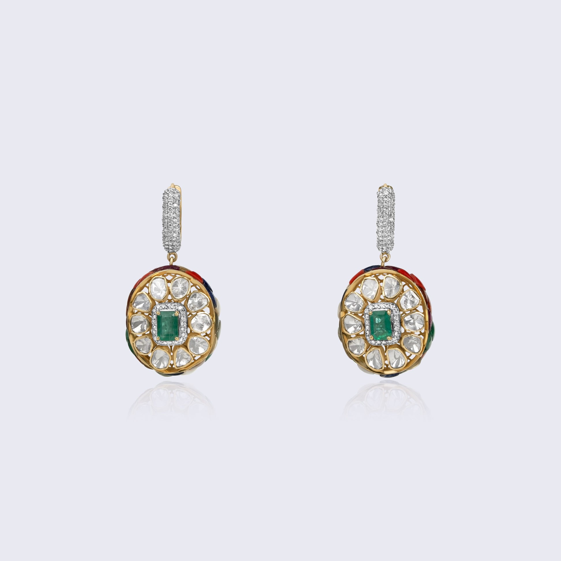 Elegant 14K gold emerald polki diamond drop earrings with central emerald stones and diamond-studded tops featuring traditional Indian craftsmanship