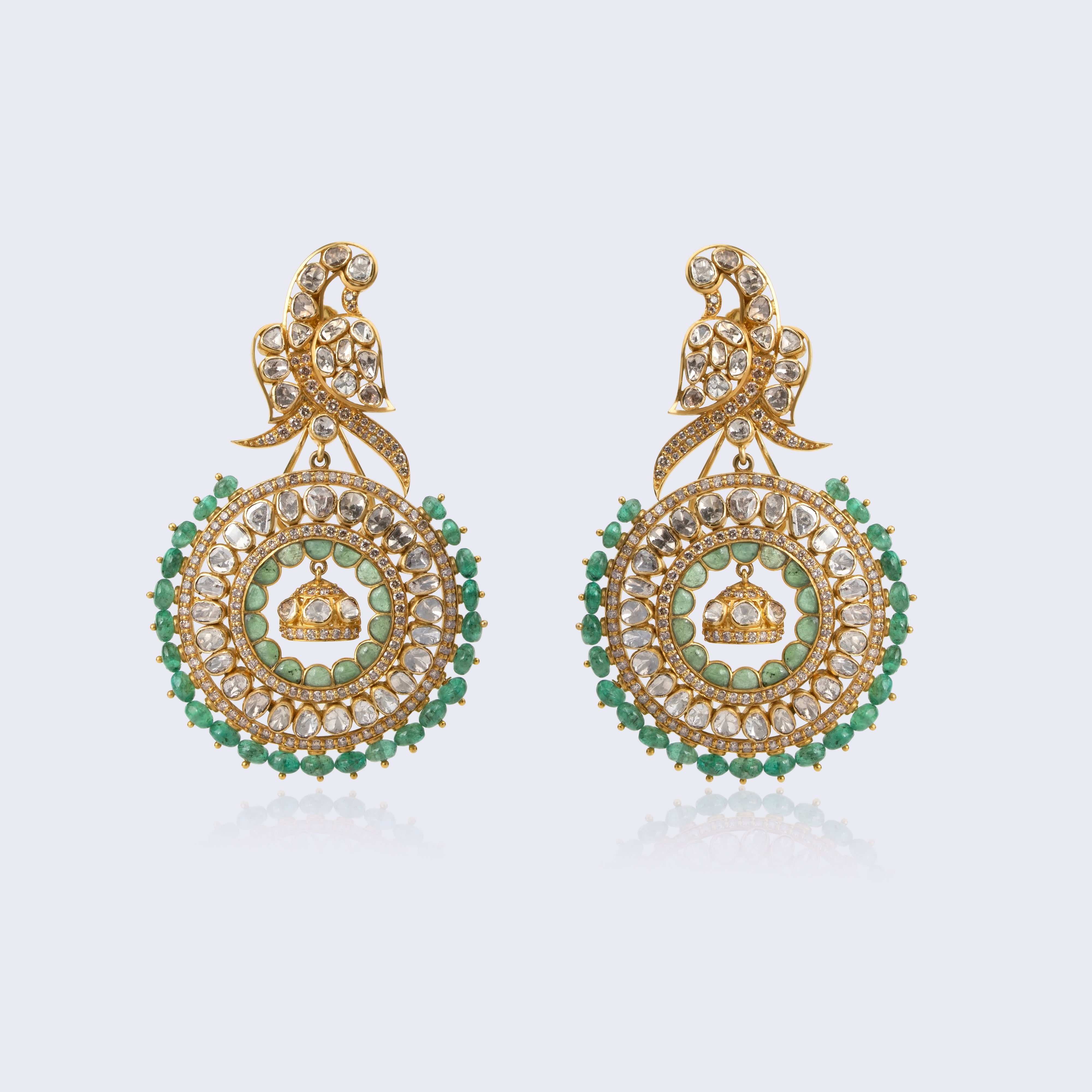 Royal 14K gold chandbali polki earrings with peacock tops, emerald borders, crown center motif, and traditional Indian craftsmanship