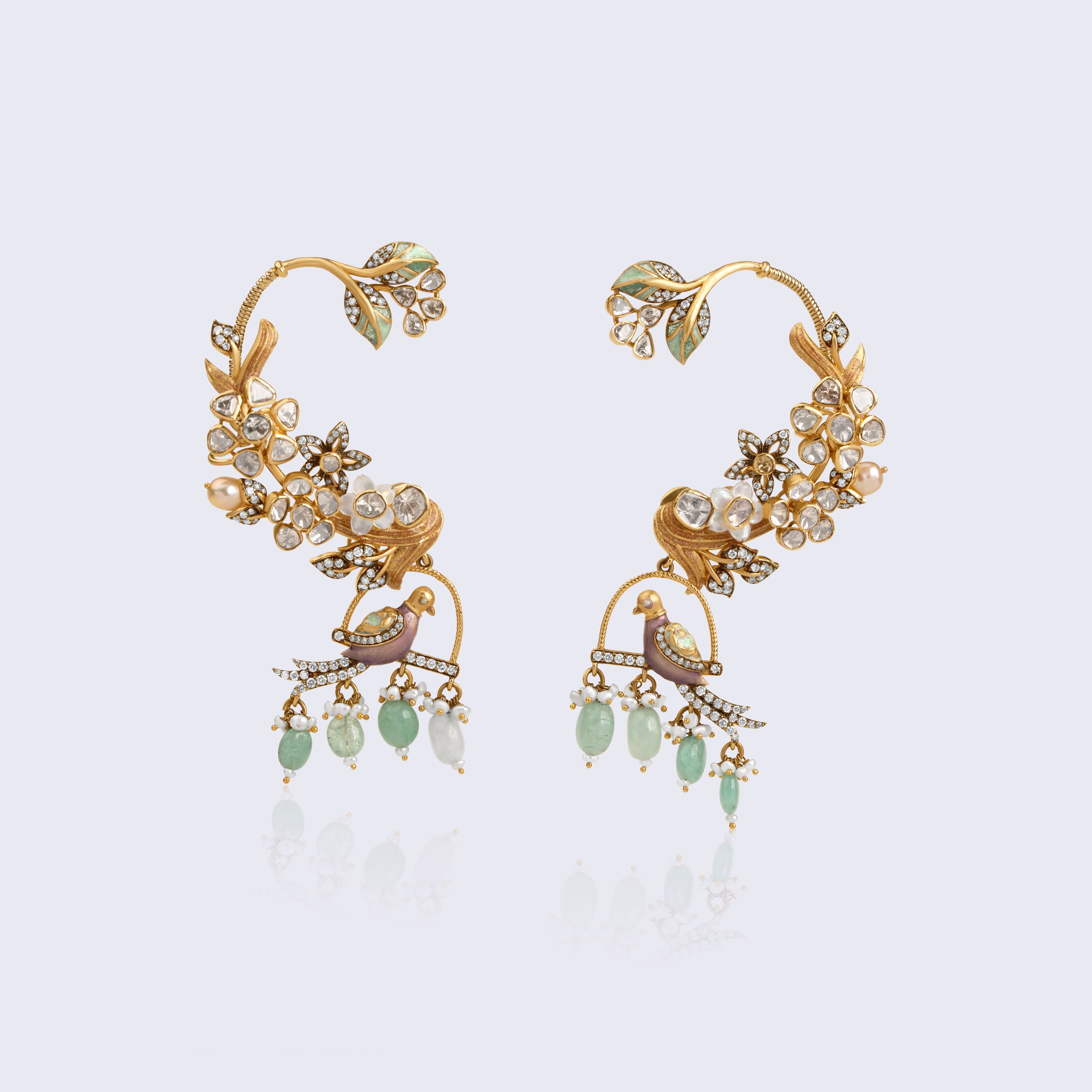 Luxury 14K gold floral ear cuff polki earrings with peacock motifs, emerald drops, and traditional Indian craftsmanship in contemporary design