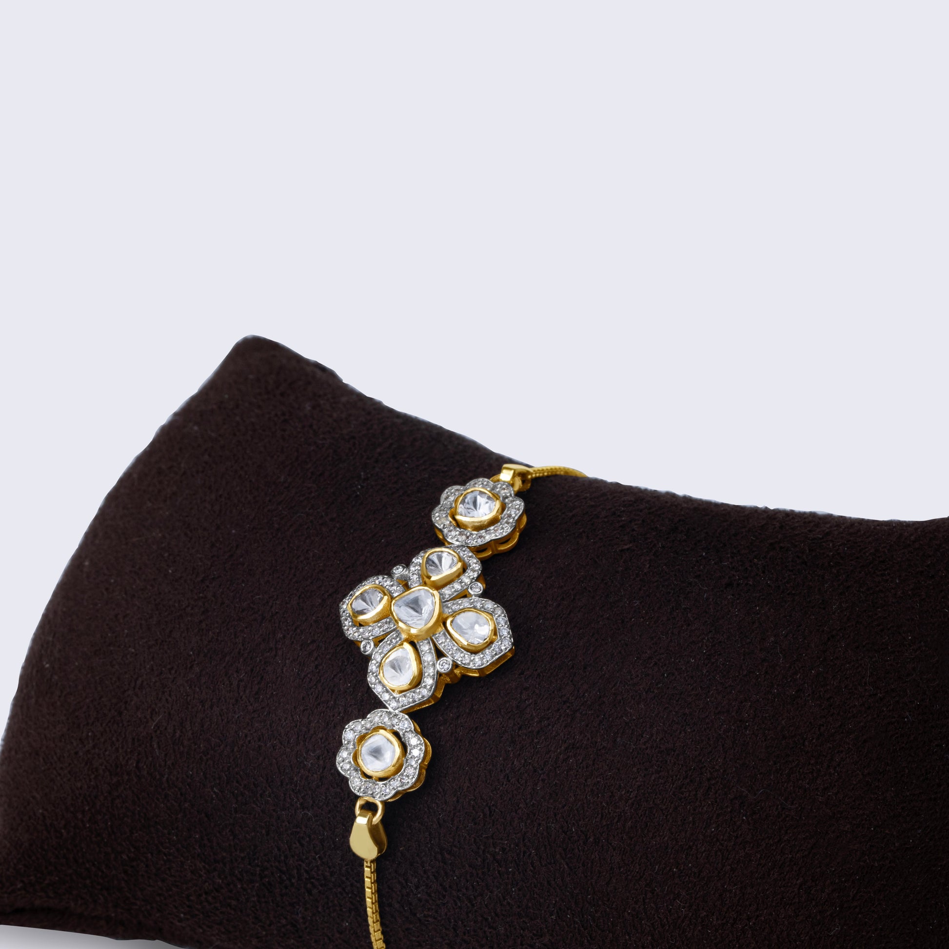 Contemporary 14K gold polki diamond cluster statement bracelet with artistic geometric pattern and rose-cut polki diamonds in varying sizes