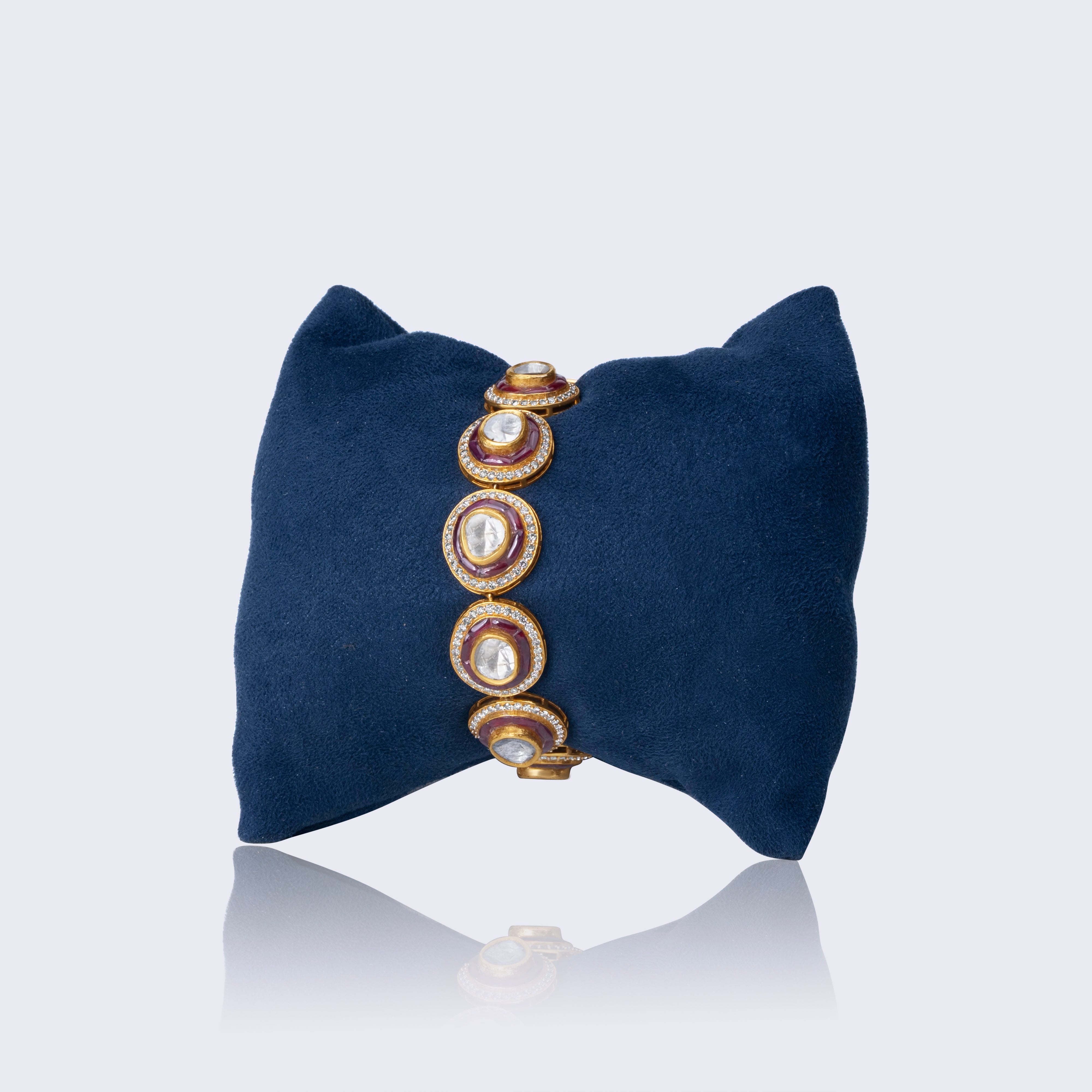 Traditional 14K gold ruby polki medallion bracelet with five circular medallions featuring polki diamonds, ruby enamel borders, and kundan craftsmanship